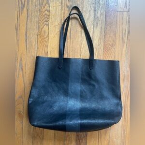 Black paint stripe Leather Transport Tote Bag with zippered pocket.